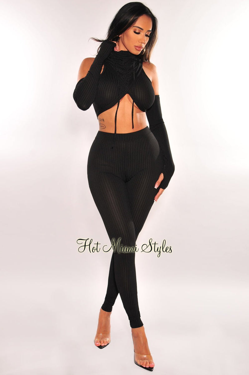 http://hotmiamistyles.com/cdn/shop/products/black-ribbed-hoodie-off-shoulder-criss-cross-high-waist-pants-two-piece-set-hot-miami-styles-425167_1200x1200.jpg?v=1686527616