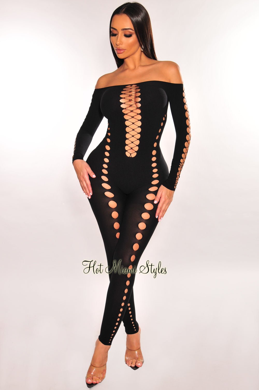 https://hotmiamistyles.com/cdn/shop/products/black-off-shoulder-lace-up-long-sleeve-seamless-jumpsuit-hot-miami-styles-896569.jpg?v=1697717457