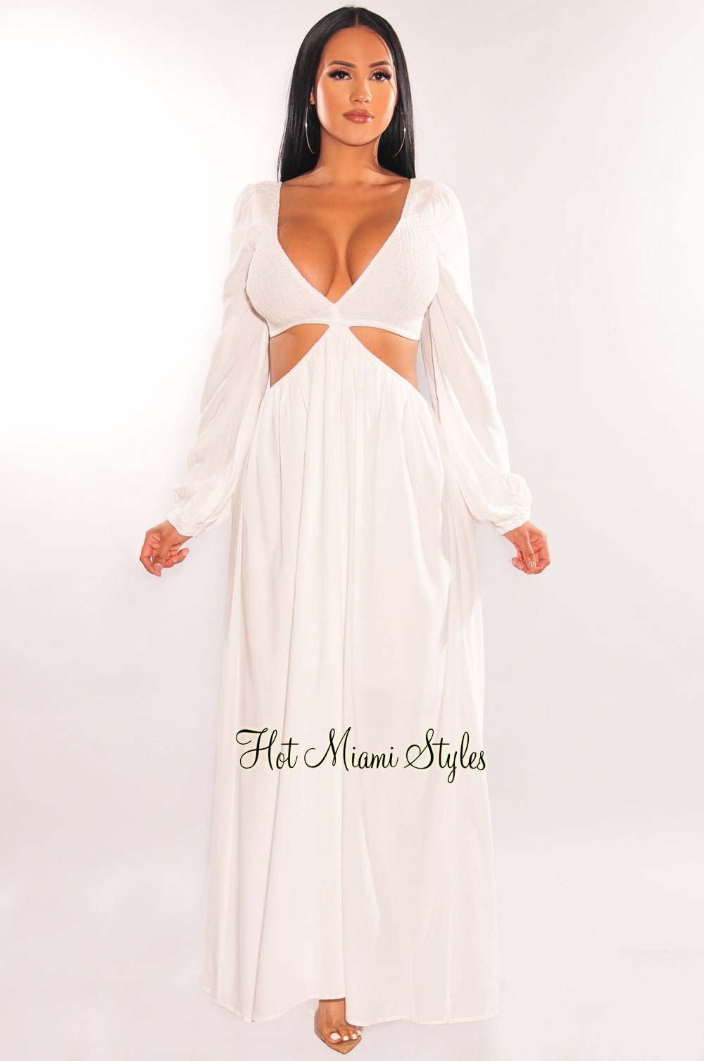 https://hotmiamistyles.com/cdn/shop/products/white-v-neck-smocked-cut-out-long-sleeve-maxi-dress-hot-miami-styles-469364.jpg?v=1683462873